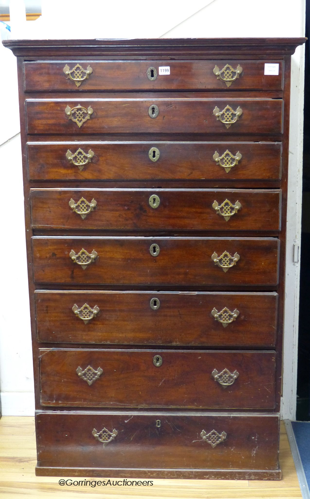 A George III mahogany chest of eight drawers. W-89, D-47, H-142cm.